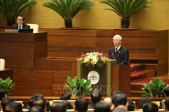 Tổng Bí thư, Chủ tịch nước Nguyễn Phú Trọng trình bày Báo cáo tổng kết công tác nhiệm kỳ 2016-2021 của Chủ tịch nước, tại Phiên khai mạc Kỳ họp. Ảnh: Dương Giang/TTXVN